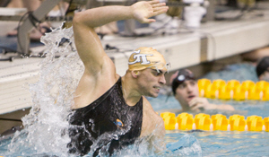 Georgia Tech senior Mickey Malul celebrates victory in the 100 breaststroke in 52.86.
