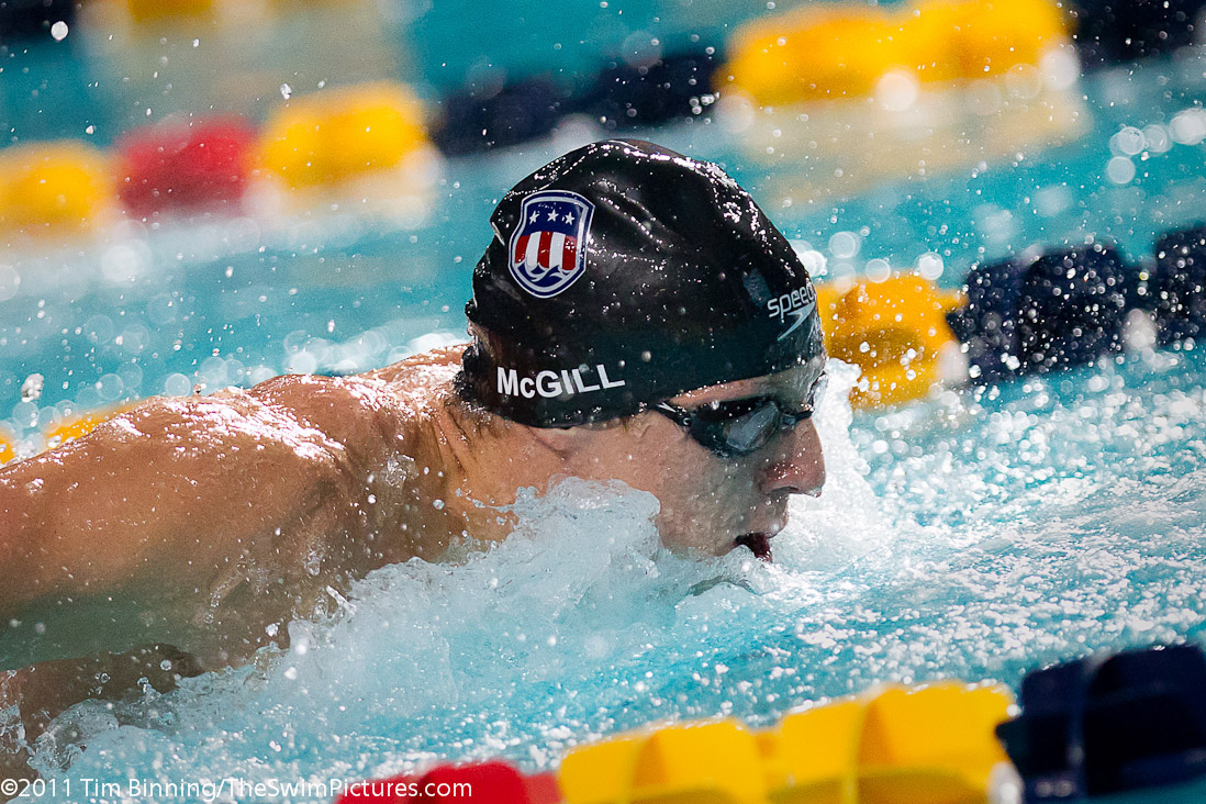 Tyler McGill of the USA swims the fly leg of the 4x100m Medley Relay at the 2011 Mutual of Omaha Duel in the Pool held December 16 and 17, 2011 at Georgia Tech University in Atlanta, Georgia.  Team USA won the event.