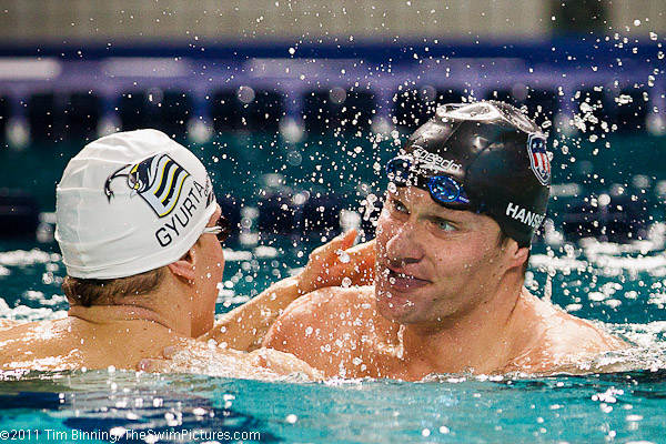 Brendan Hansen of the USA is congratulated by Daniel Gyurta of Hungary after winning the 200m Breaststroke at the 2011 Mutual of Omaha Duel in the Pool held December 16 and 17, 2011 at Georgia Tech University in Atlanta, Georgia.