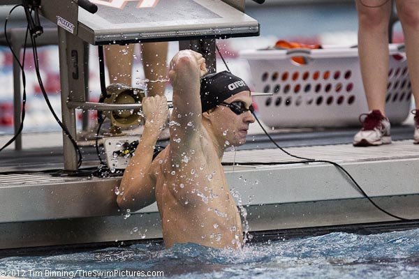 Virginia Tech Junior Zach McGinnis wins the 100 back in 46.79 to lead the Hokies to a 1-3 finish.