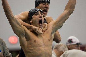 The Auburn team of Pascal Wollach, Adam Klein, Tyler McGill and Matt Targett celebrate victory in the 400 yard medley relay with a new US Open record 3:01.39.  Second place California also broke the previous US Open record.