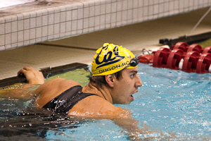 Cal Sophomore Damir Dugonjic demolishes the NCAA record in winning the 100 breaststroke in 50.86.