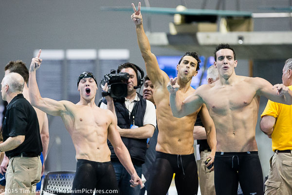 Michael Domagala, Dylan Carter and Cristian Quinjtero of USC celebrate as  the team repeats as 800 free relay champions at the 2015 NCAA Division I Men's Swimming and Diving Championships held at the University of Iowa.