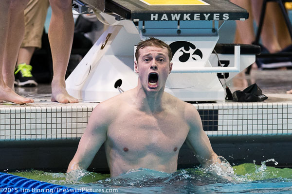 Texas Sophomore Jack Conger celebrates the team's 400 medley relay victory after anchoring the team with a 40.96 freestyle split at the 2015 NCAA Division I Men's Swimming and Diving Championships held at the University of Iowa.