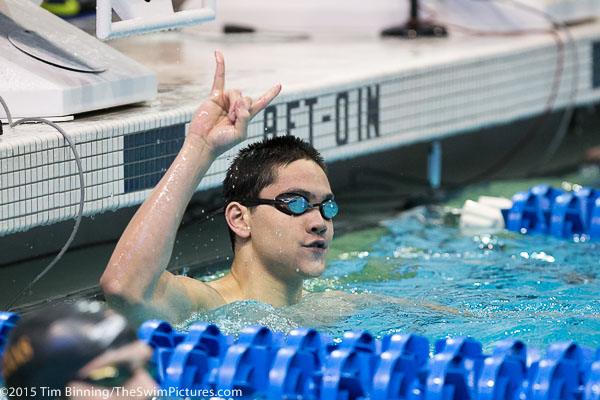 Texas Freshman Joseph Schooling flashes the longhorn hookem after winning the 100 yard butterfly at the 2015 NCAA Division I Men's Swimming and Diving Championships held at the University of Iowa.