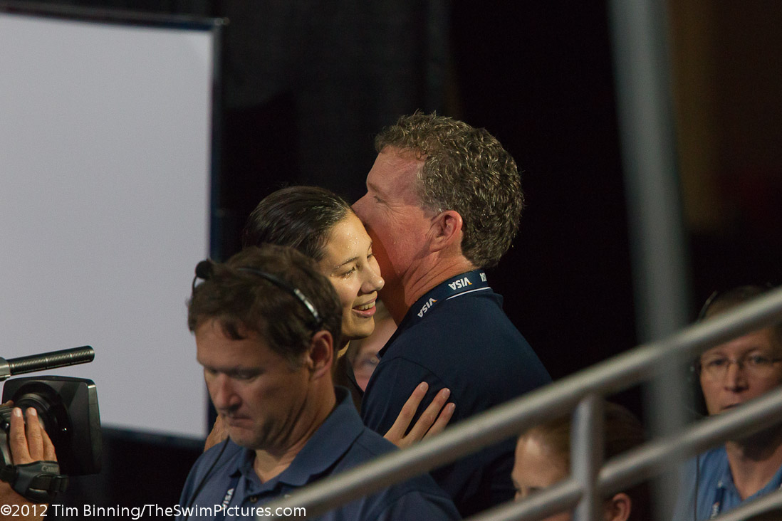 Micah Lawrence is congatulated by her coach Dave Marsh of SwimMAC Carolina after she captured a spot on the US Olympic Team.