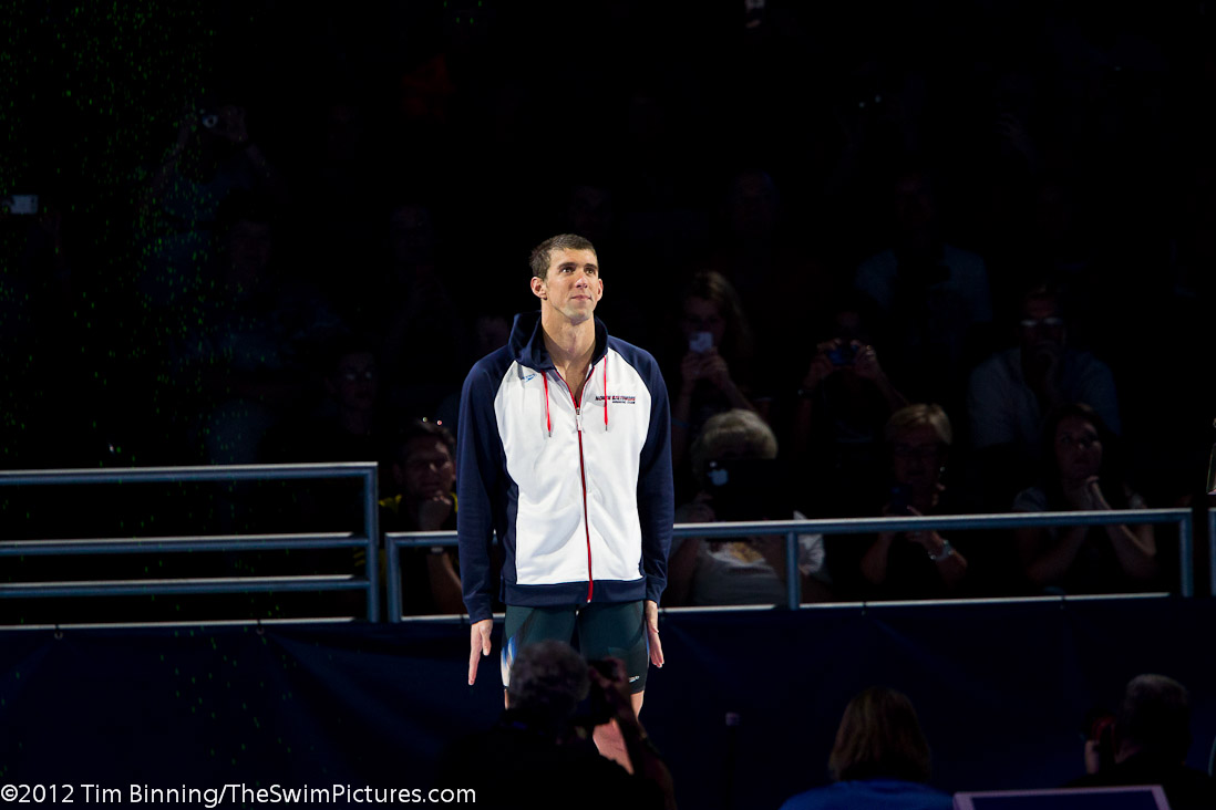Michael Phelps on the awards stand following his victory in the 200 IM.