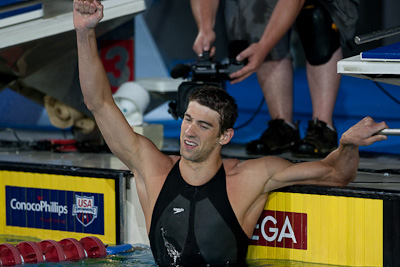 Michael Phelps swims to a new world record in the 100 butterfly at the 2009 ConocoPhillips USA National Swimming Championships and World Championship Trials