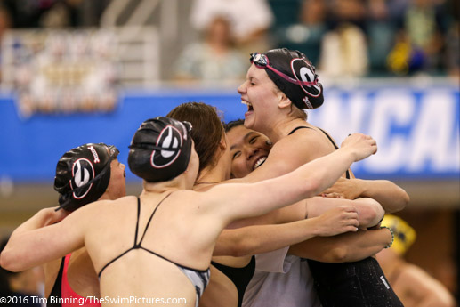 Olivia Smoliga of Georgia is congratulated by teammates following her 50 free victory at the 2016 NCAA Division 1 Women's Swimming and Diving Championships